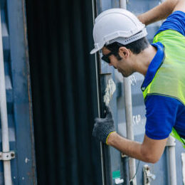 Port Authority team open look inside cargo goods container cabinet for safety according rule and Intermodal standard.